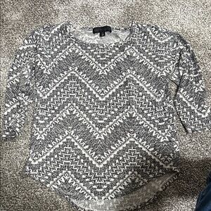 Almost Famous Black and White Patterned Jersey Top